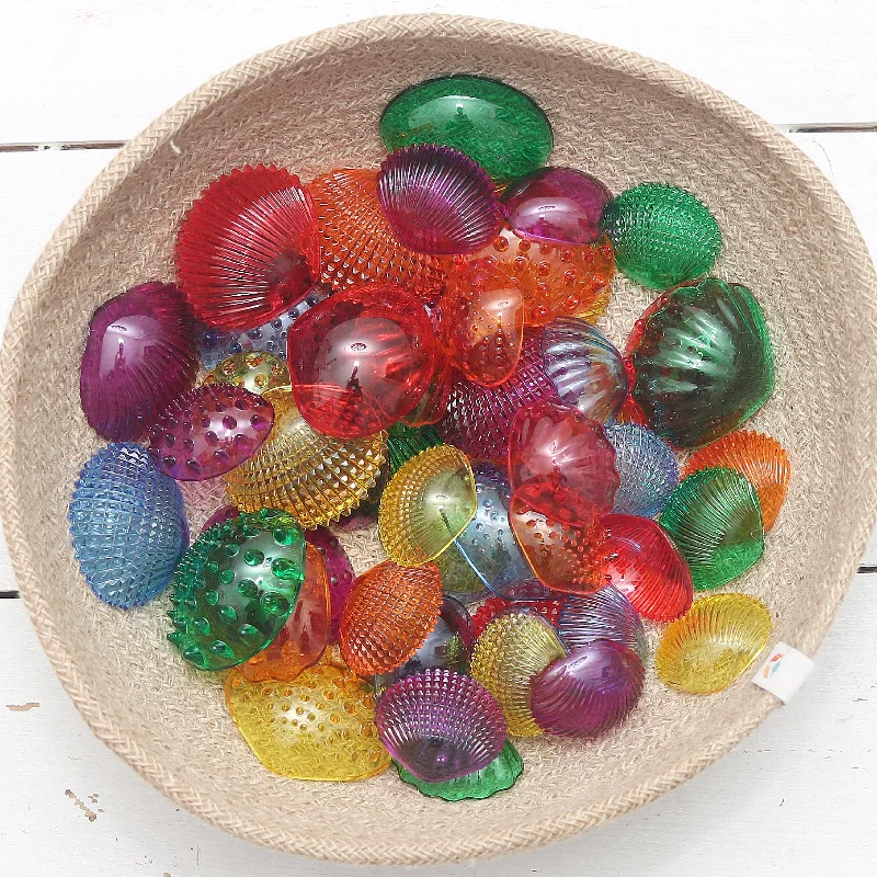 Digital Plaything for dinosaur fans-Tickit Transparent Tactile Shells - 56 Shells